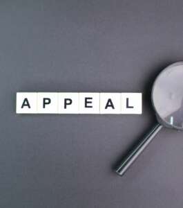magnifying glass with words of appeal